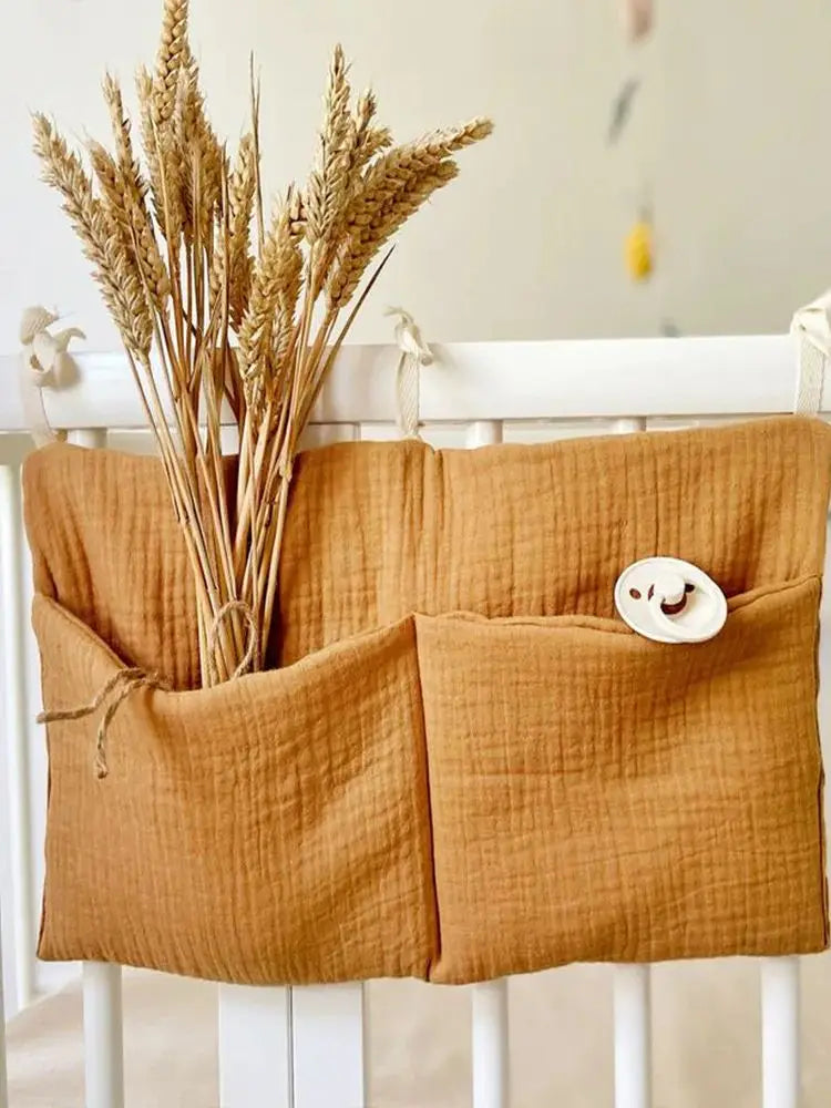 Organiseur de lit bébé